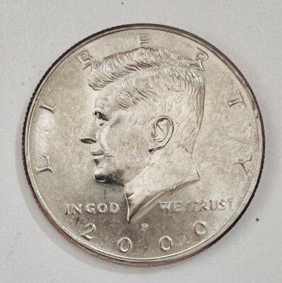 2000 Kennedy half dollar doubled die obverse error showing doubling on LIBERTY inscription under magnification