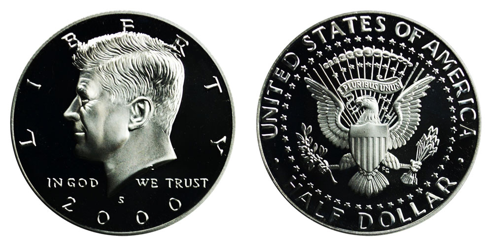 2000 Kennedy half dollar grading strip showing four condition tiers from worn to gem uncirculated